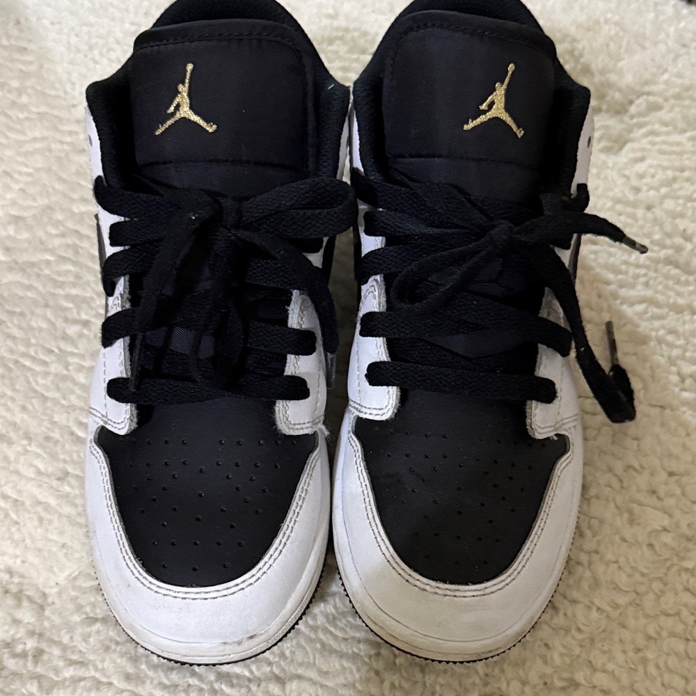 Jordan Kids Black and White Sneakers with Gold Accents